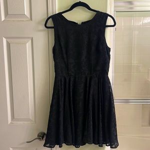 Black lace overlay sleeveless cocktail dress
